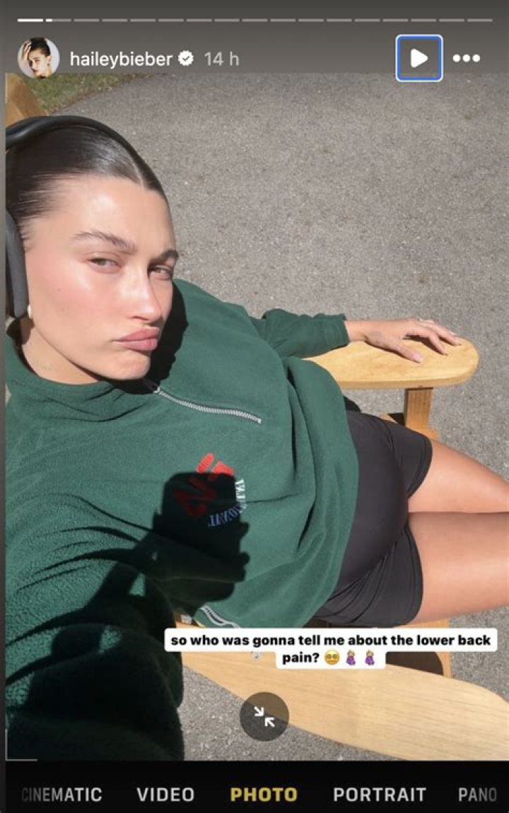 Hailey Bieber Wears Her ‘B’ Necklace While on Romantic Stroll with