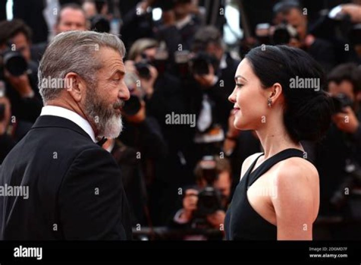 Mel Gibson and girlfriend Rosalind Ross attend Blood Father premiere at