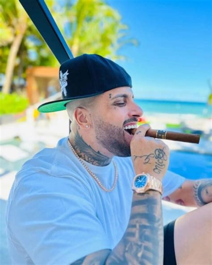 Nicky Jam Spotted Wearing Patek Philippe Travel Time Superwatch