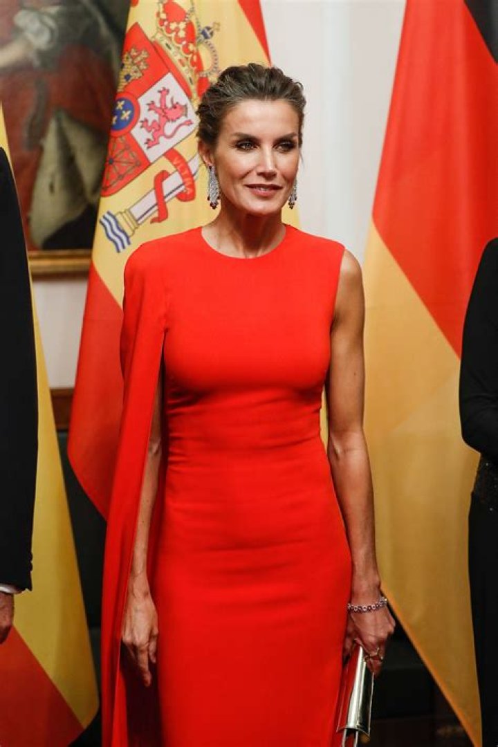 Queen Letizia stylish in scarlet at awards ceremony with King Felipe in