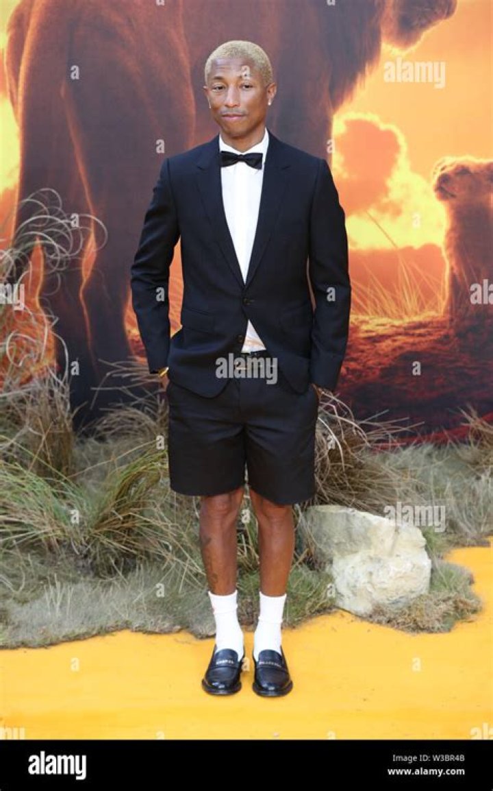 The Lion King Pharrell Williams joined by his wife Helen Lasichanh