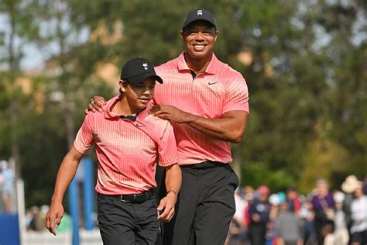Tiger Woods Gives Son Charlie, 11, Big Hug After Showing Off Twinning